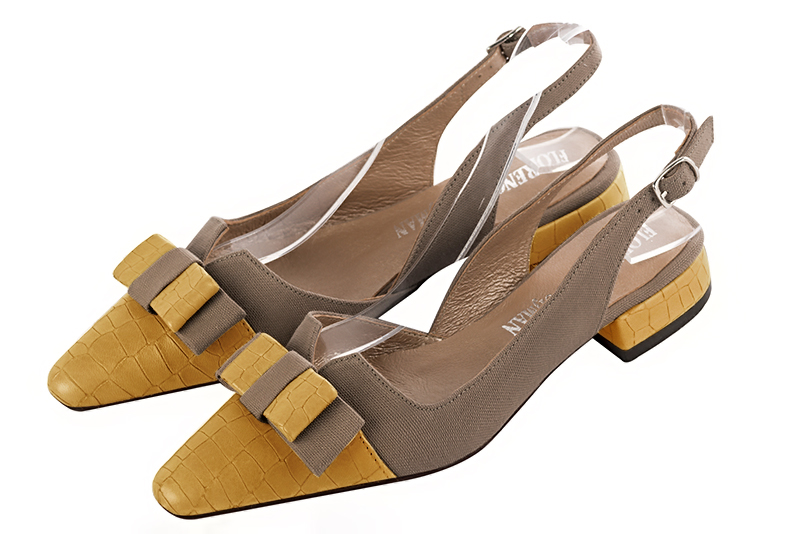 Mustard yellow and taupe brown women's open back shoes, with a knot. Tapered toe. Flat block heels. Front view - Florence KOOIJMAN